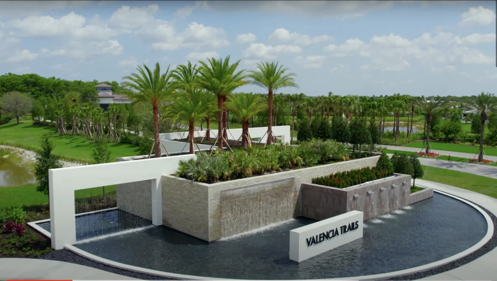 Photorealistic hero shot of a luxury Mediterranean single-family home at Valencia Trails in Naples Florida, Sand Dollar elevation with terracotta roof, pristine white stucco, lush tropical landscaping, sparkling lake in background, bright blue sky, perfectly centered on clean white gradient background, 8K studio quality, sharp architectural detail, luxury real estate photography