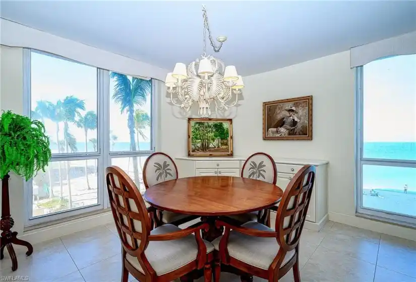 Dining area of condo with southern and western view of the Gulf and beach