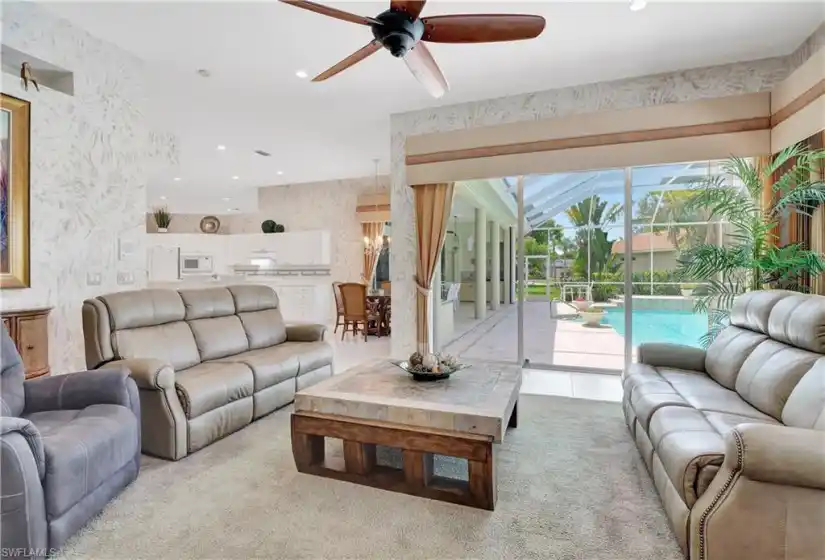Family room opens to the pool