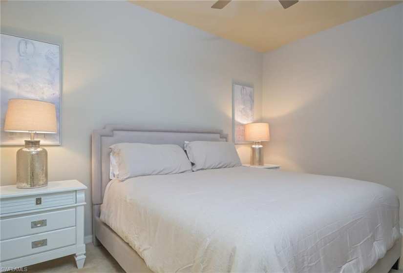 Beautifully done master bedroom with new furniture and fresh paint!
