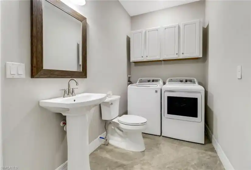 Laundry room with powder room