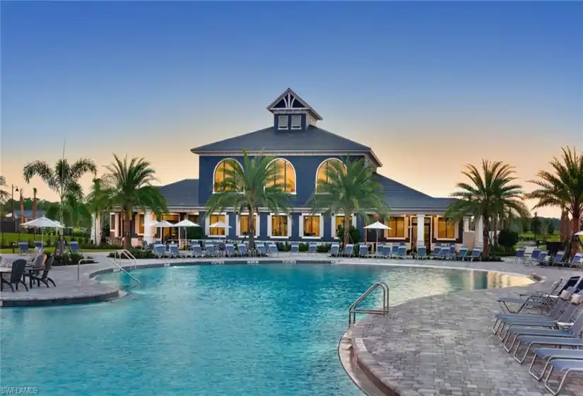Back of clubhouse overlooking resorts-style community pool enjoyed by all residents and their guests.