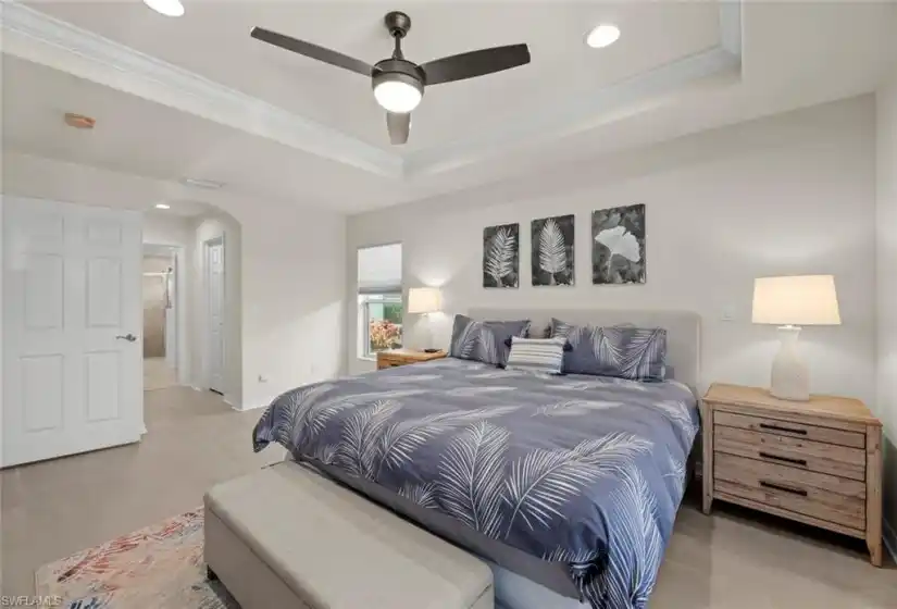 Master bedroom hall leads to 2 walk-in closets and ensuite bath