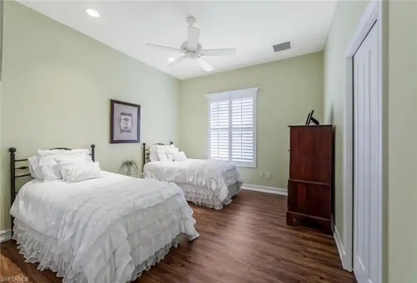 Guest bedroom #2 with plantation shutter/ molding window, recessed lights and ample space!