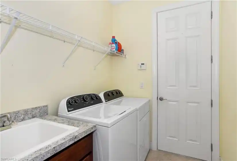 With sink and access to garage
