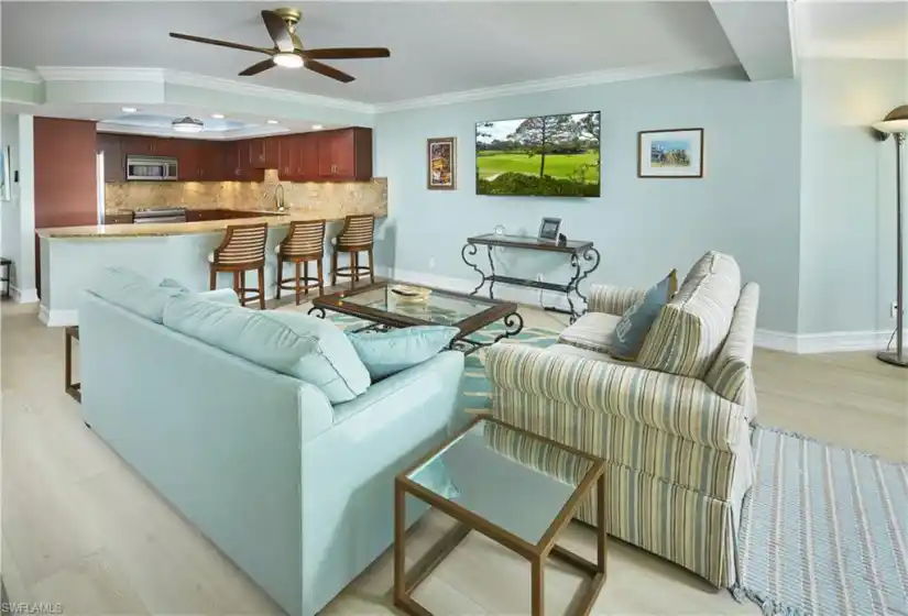This expansive living area is the perfect space for friends and family to gather together.