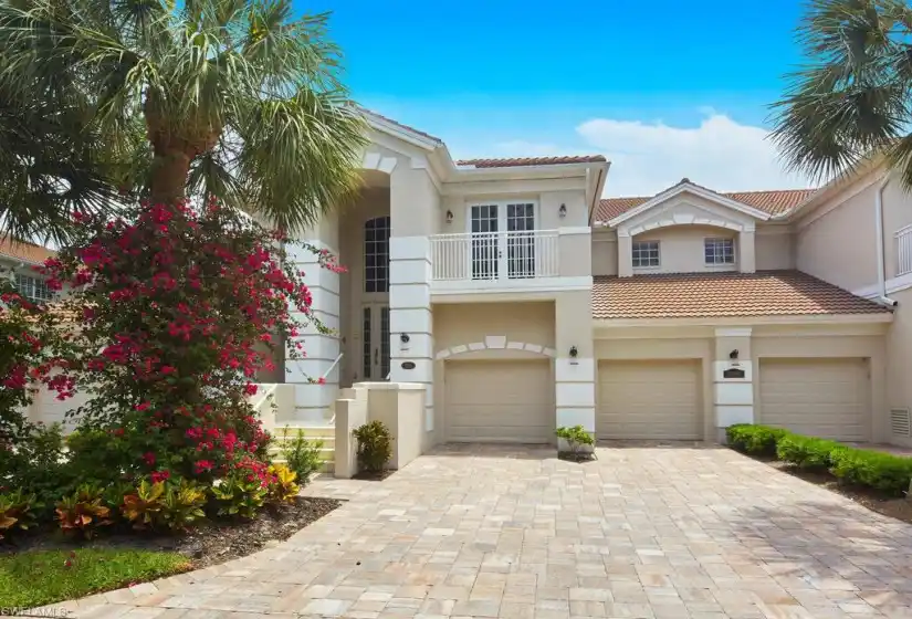 Gorgeous entry with 2 car garage and plenty of driveway space for additional parking.