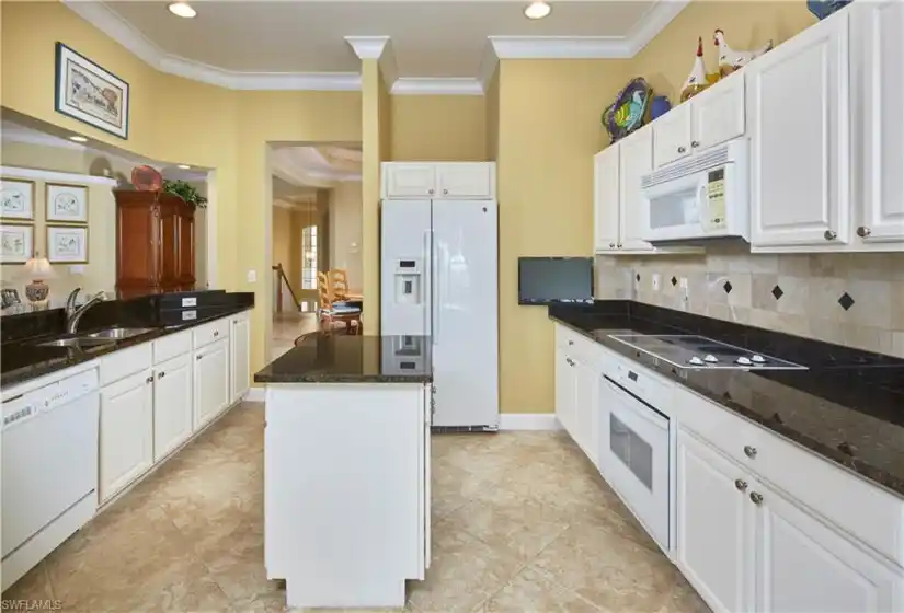 Gorgeous open kitchen with ample cabinetry.