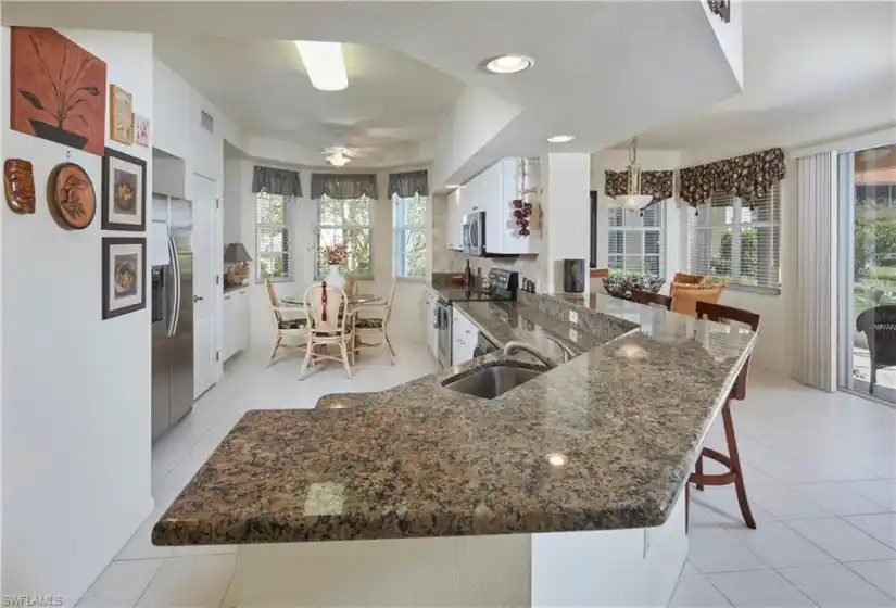 Spacious kitchen with plenty of room for meal preparation.